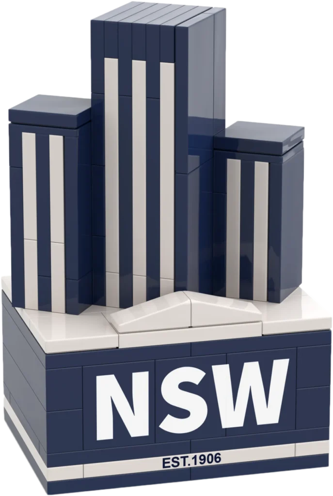 LEGO-inspired blue and white building sculpture with a large 'NSW' sign and 'EST.1906' at the base